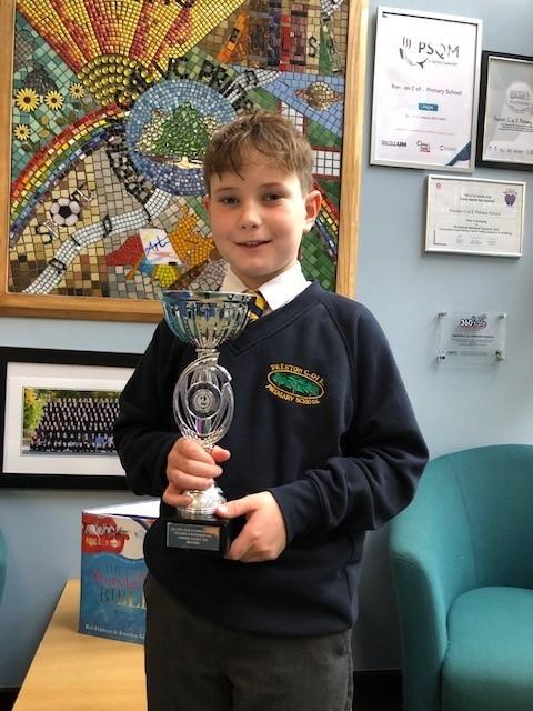 Oliie from Mulberry Class with his trophy