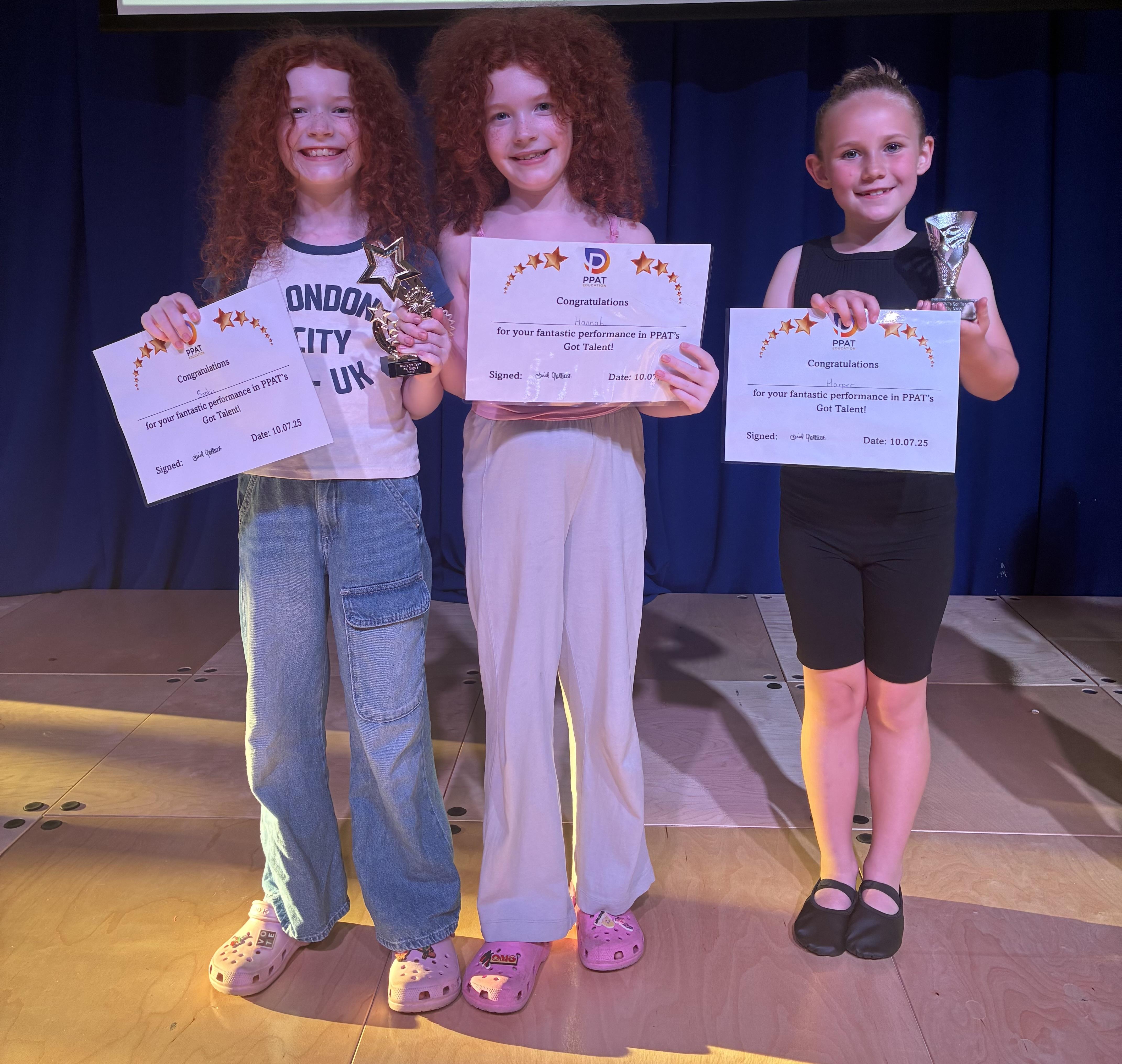 Sophie, Hannah & Harper with their certificates and trophies