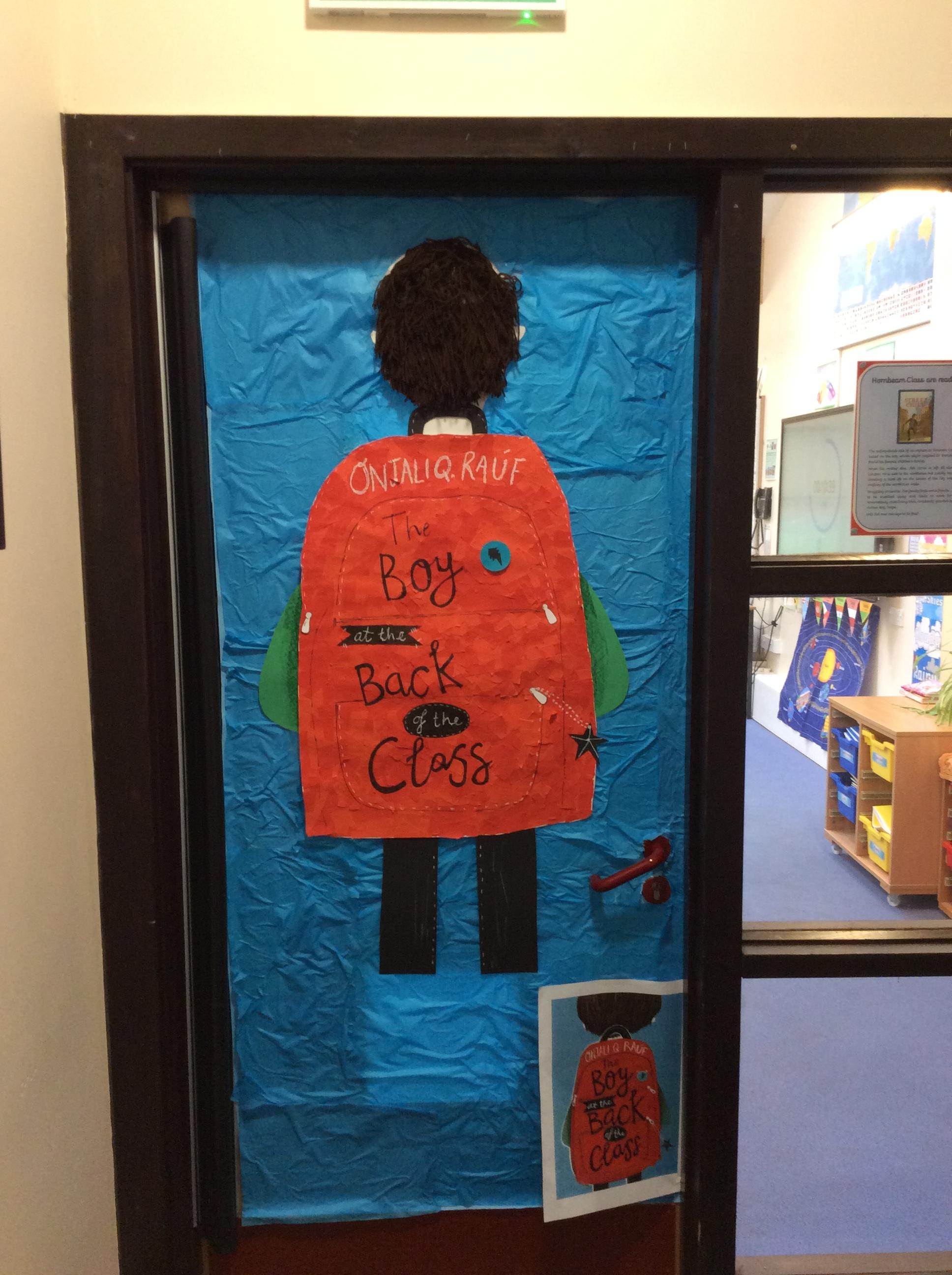 Our book cover design based on 'The Boy at the Back of the Class' by Onjali Q. Rauf